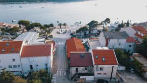 an aerial view of a town next to the water at Skunca’s house in Novalja