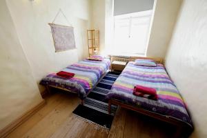 Postel nebo postele na pokoji v ubytování AirHome - Cozy Apartment