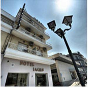 a street light in front of a hotel at Hotel Jason in Volos