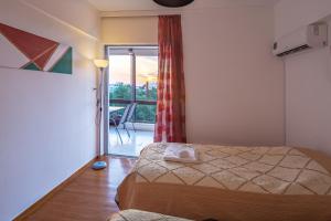 Posteľ alebo postele v izbe v ubytovaní Archer - Sea view apartment