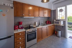 Kuchyňa alebo kuchynka v ubytovaní Archer - Sea view apartment + 14 fotografií