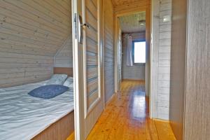 Postel nebo postele na pokoji v ubytování Domki Dominika