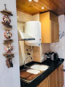 Køkken eller tekøkken på Sesimbra Sun Bay