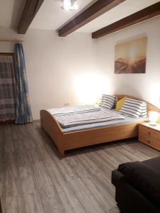 Postel nebo postele na pokoji v ubytování Ferienwohnung Dürnberger