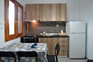 Kuchyňa alebo kuchynka v ubytovaní Apartments Konstantinidis + 24 fotografií