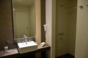 Um banheiro em Abril Hotel Boutique