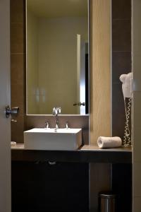 Um banheiro em Abril Hotel Boutique