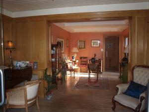 a living room with a couch and a table at Shelmalier House in Athlone