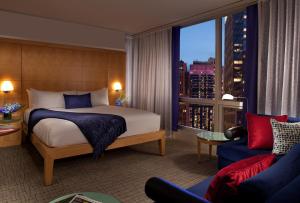 Giường trong phòng chung tại Millennium Premier New York Times Square +61 ảnh