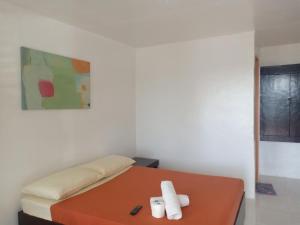 Voodi või voodid majutusasutuse Dahilig Resort toas