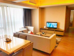 TV a/nebo společenská místnost v ubytování Yuwa Serviced Residence