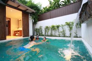 Der Swimmingpool an oder in der Nähe von Mimosa Resort & Spa