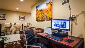 a computer sitting on a desk in a room at Best Western Heritage Inn in Vacaville