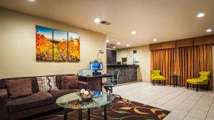 a living room with a couch and a table at Best Western Heritage Inn in Vacaville