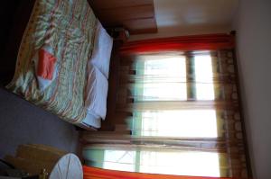 Posteľ alebo postele v izbe v ubytovaní Hotel Bona
