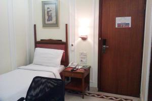 Postel nebo postele na pokoji v ubytování Hiltop Hotel