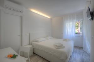 Кровать или кровати в номере Rione San Carlo