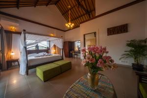 Cama o camas de una habitación en Casa Priya Seminyak 48 fotos más