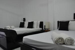 Letto o letti in una camera di Villa Hotel
