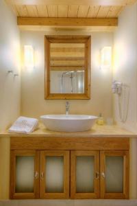 Koupelna v ubytování Ritsos Guesthouse + 37 fotografií
