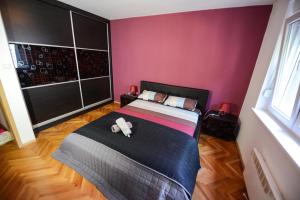 Postel nebo postele na pokoji v ubytování Square Vanilla Apartments