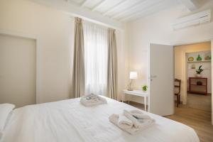 Llit o llits en una habitació de Apartments Florence - Fiesolana Balcony