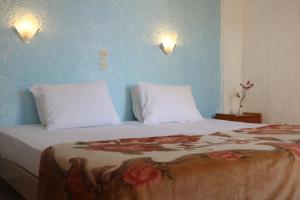 Postel nebo postele na pokoji v ubytování Madalenas B&B