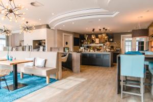 Posezení v ubytování Hotel Landhaus an de Dün