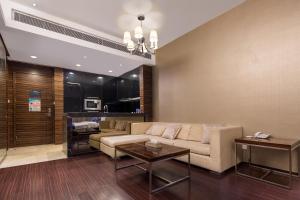 Posezení v ubytování SLOWCOM-Xingyue Pa Zhou Apartment