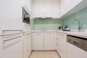 Kuchyň nebo kuchyňský kout v ubytování SLOWCOM-Xingyue Pa Zhou Apartment