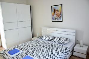 Postel nebo postele na pokoji v ubytování Apartmani Novosel