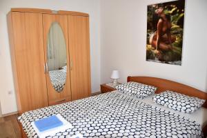 Postel nebo postele na pokoji v ubytování Apartmani Novosel