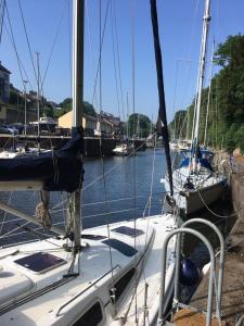 a group of sailboats docked in a harbor at Stunning House in Felinheli Marina in Y Felinheli