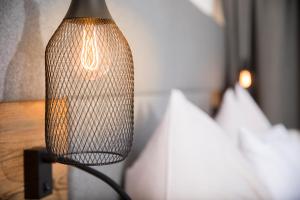 Posteľ alebo postele v izbe v ubytovaní Hotel & Appartements Heigenhauser