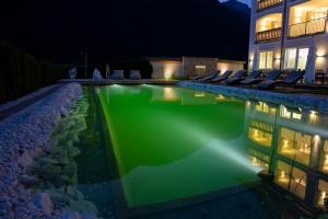 Bazén v ubytovaní Hotel & Appartements Heigenhauser alebo v jeho blízkosti