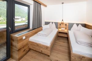Posedenie v ubytovaní Hotel & Appartements Heigenhauser