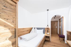 Posteľ alebo postele v izbe v ubytovaní Hotel & Appartements Heigenhauser