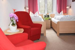 Postel nebo postele na pokoji v ubytování Hotel Nordlicht