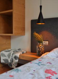 Postel nebo postele na pokoji v ubytování Apartments ALPA VITA