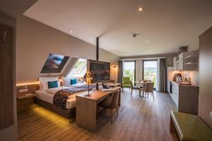 Kuchyň nebo kuchyňský kout v ubytování AKZENT Hotel Villa Saxer