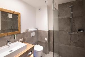 Kúpeľňa v ubytovaní Hotel & Appartements Heigenhauser