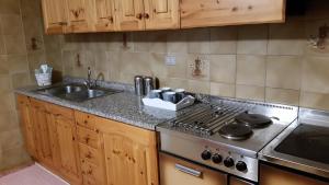 Kuchyň nebo kuchyňský kout v ubytování il bosco in casa + 28 fotografií