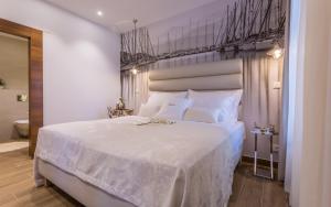 Кровать или кровати в номере Apartments Marina Novi
