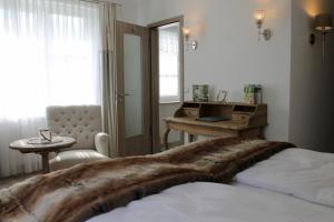 Ein Bett oder Betten in einem Zimmer der Unterkunft Spreewaldresort Seinerzeit