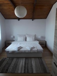Łóżko lub łóżka w pokoju w obiekcie Villa Osa Modlin Airport