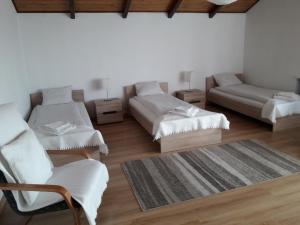 Łóżko lub łóżka w pokoju w obiekcie Villa Osa Modlin Airport