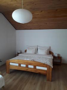 Łóżko lub łóżka w pokoju w obiekcie Villa Osa Modlin Airport