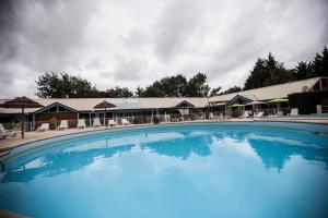 The swimming pool at or near Village Vacances Passion Les Brigantins