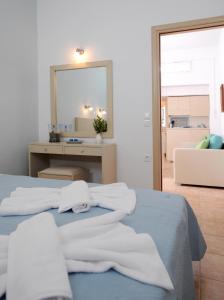 Letto o letti in una camera di Aigaio Studios tinos