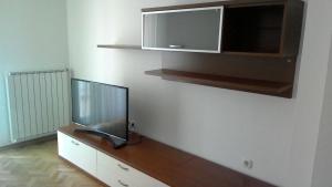 TV a/nebo společenská místnost v ubytování Apartment